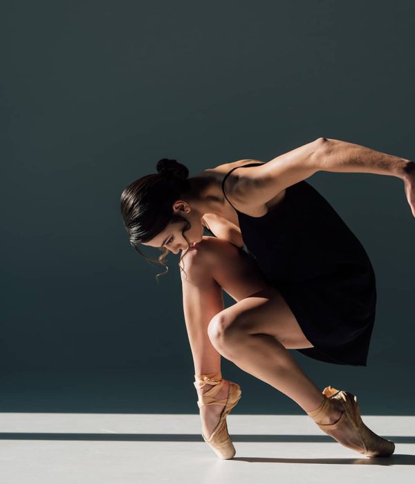 elegant-beautiful-ballerina-in-black-dress-dancing-JMMUADB.jpg